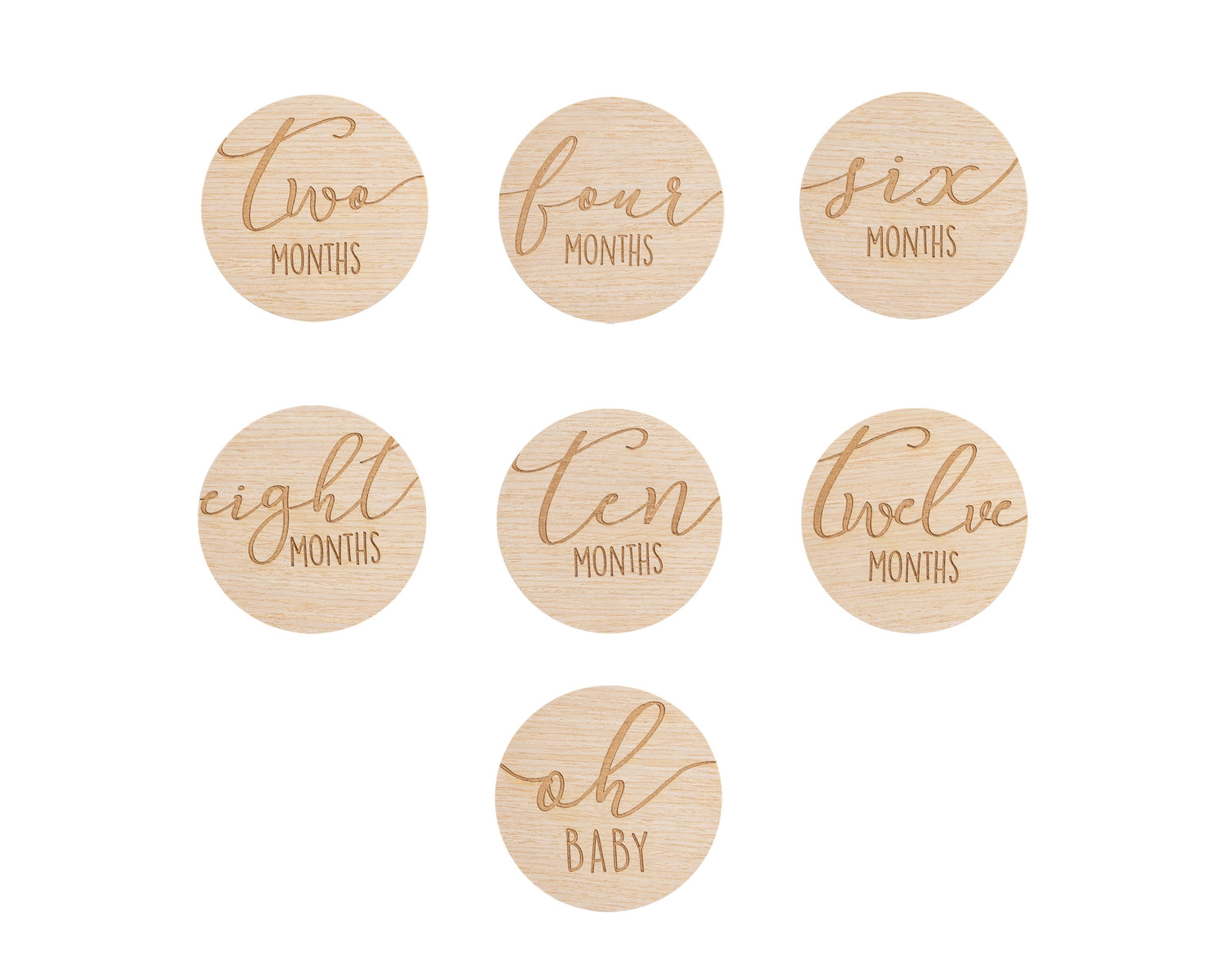 Set of wooden discs with milestone text for baby&