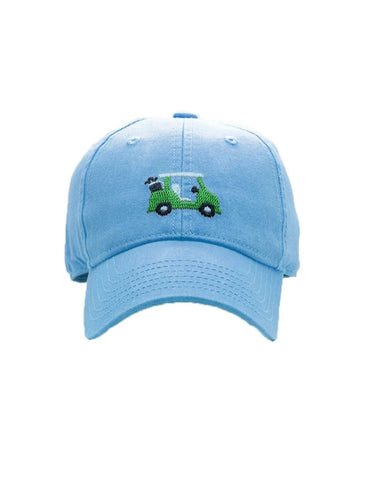 blue hat with green golf cart