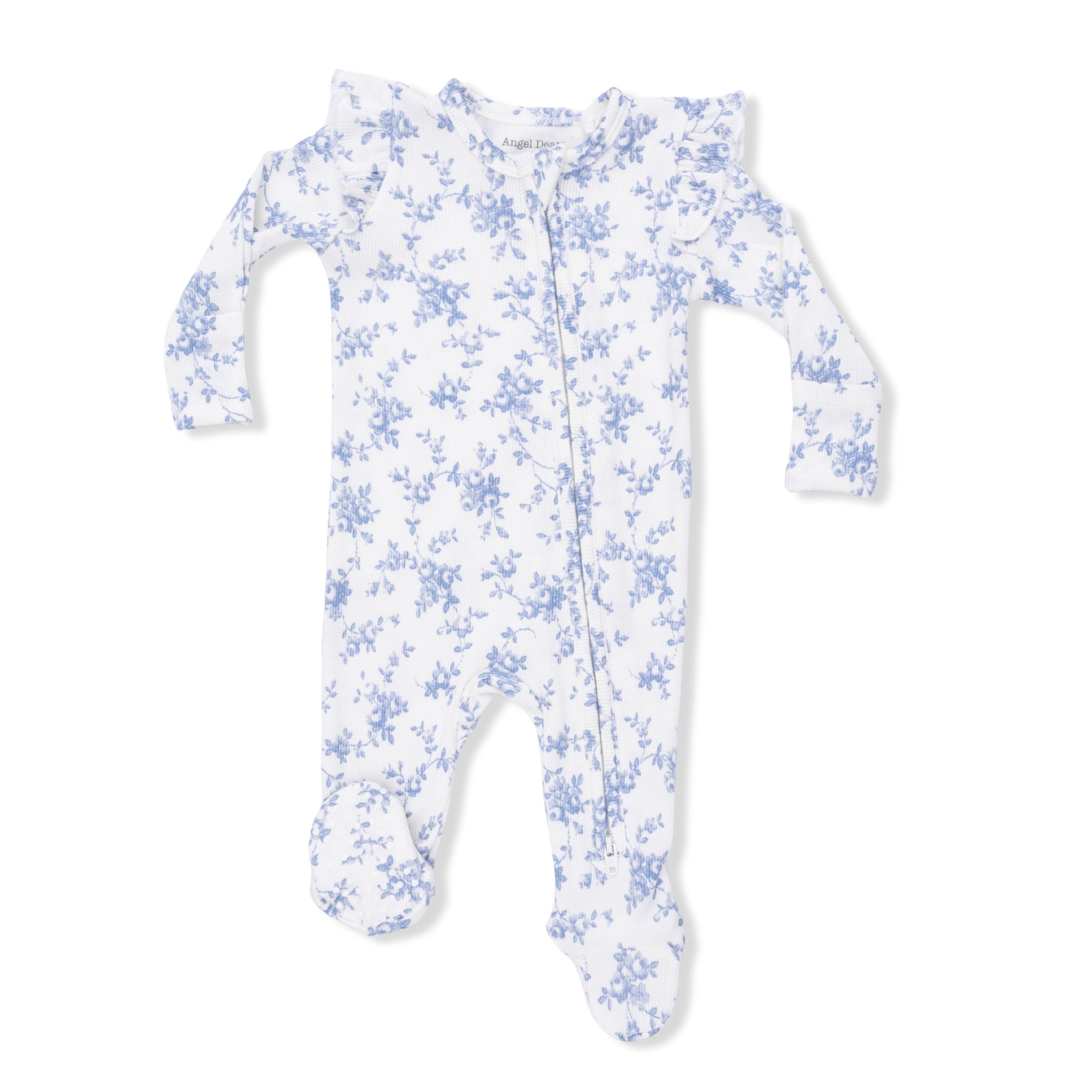 White baby onesie with blue floral pattern on a white background