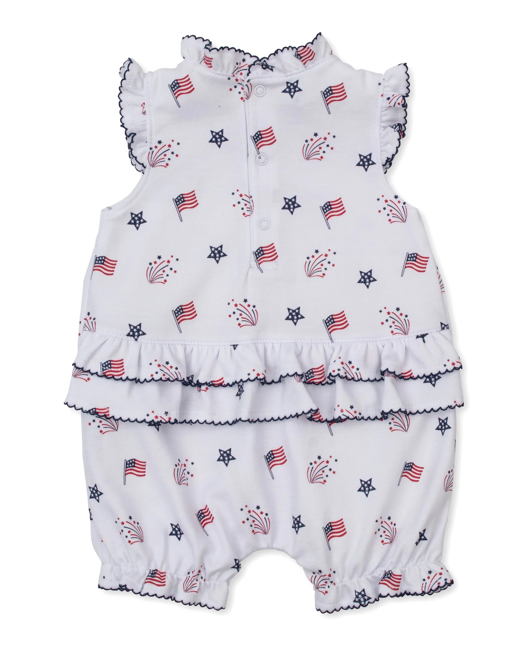 white ruffle playsuit with flags, fireworks and blue stars all over, navy blue trim