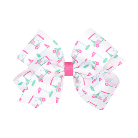 white bow with pink and green golf carts all over