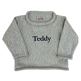 gray sweater with Teddy monogram