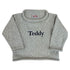 gray sweater with Teddy monogram
