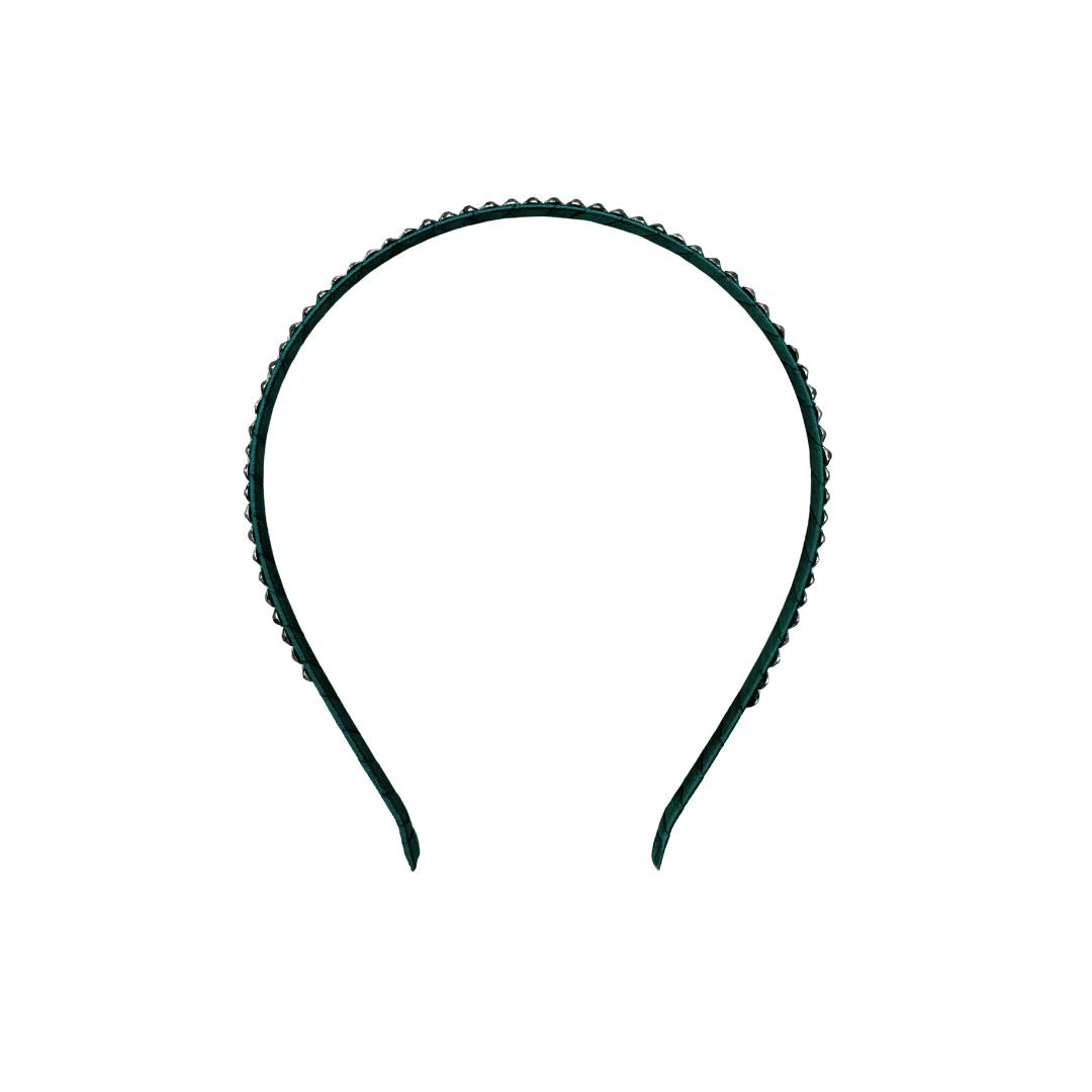 green headband on a white background