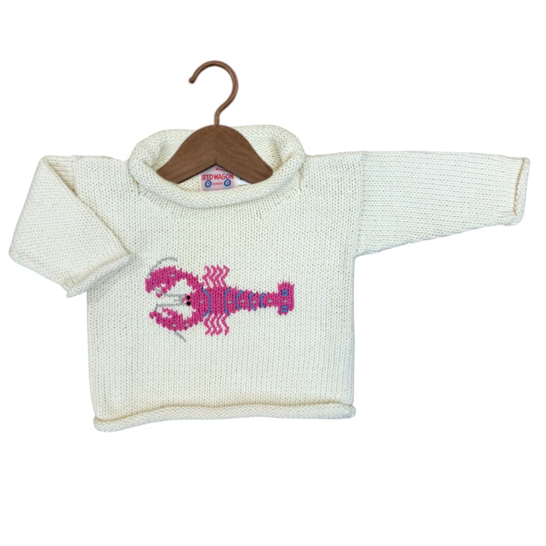 A cream-colored knit baby sweater with a pink lobster design on the chest, displayed on a wooden hanger against a white background.
