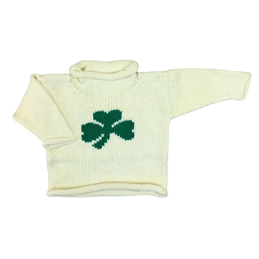 Knitted sweater with a green shamrock design on a white background