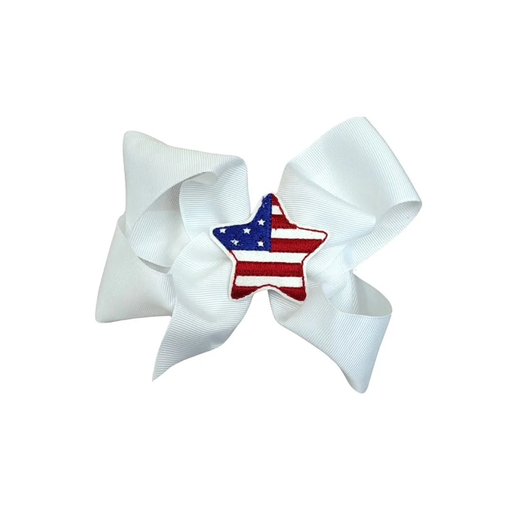 white grosgrain bow with american flag star embroidered in center