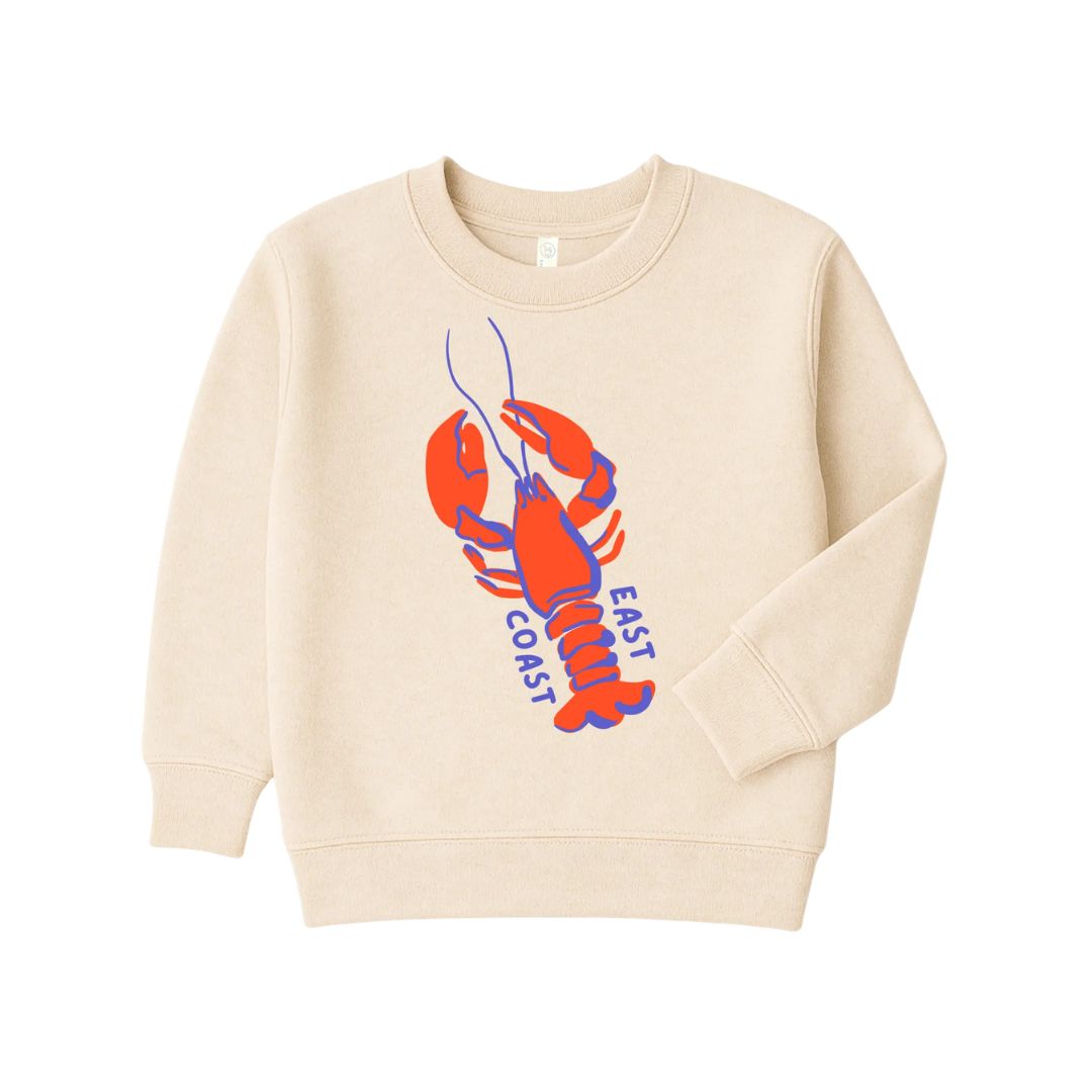 A cream-colored crewneck sweatshirt featuring a graphic of a red and blue lobster with the words &