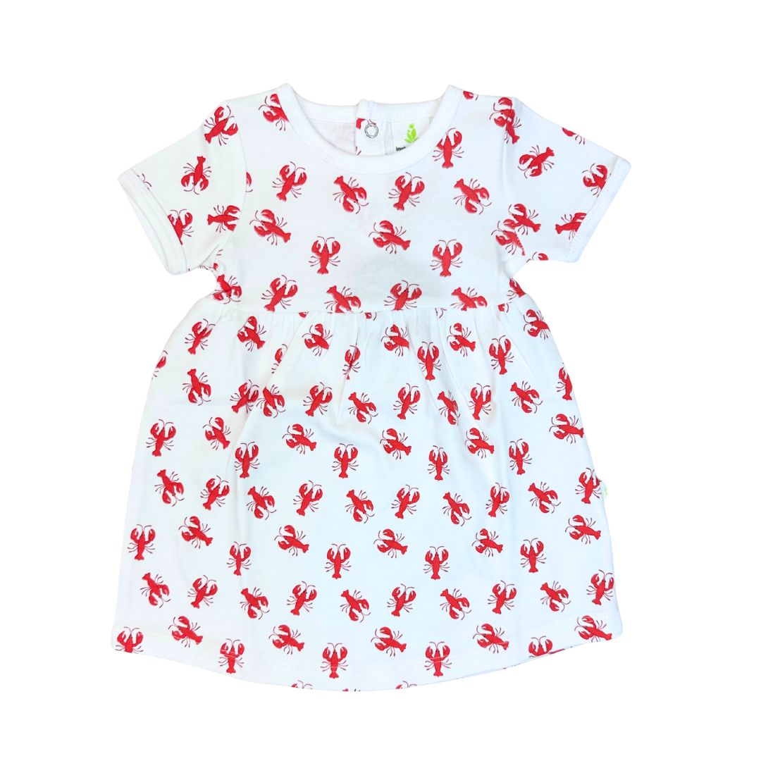 White dress with red lobster pattern on a white background