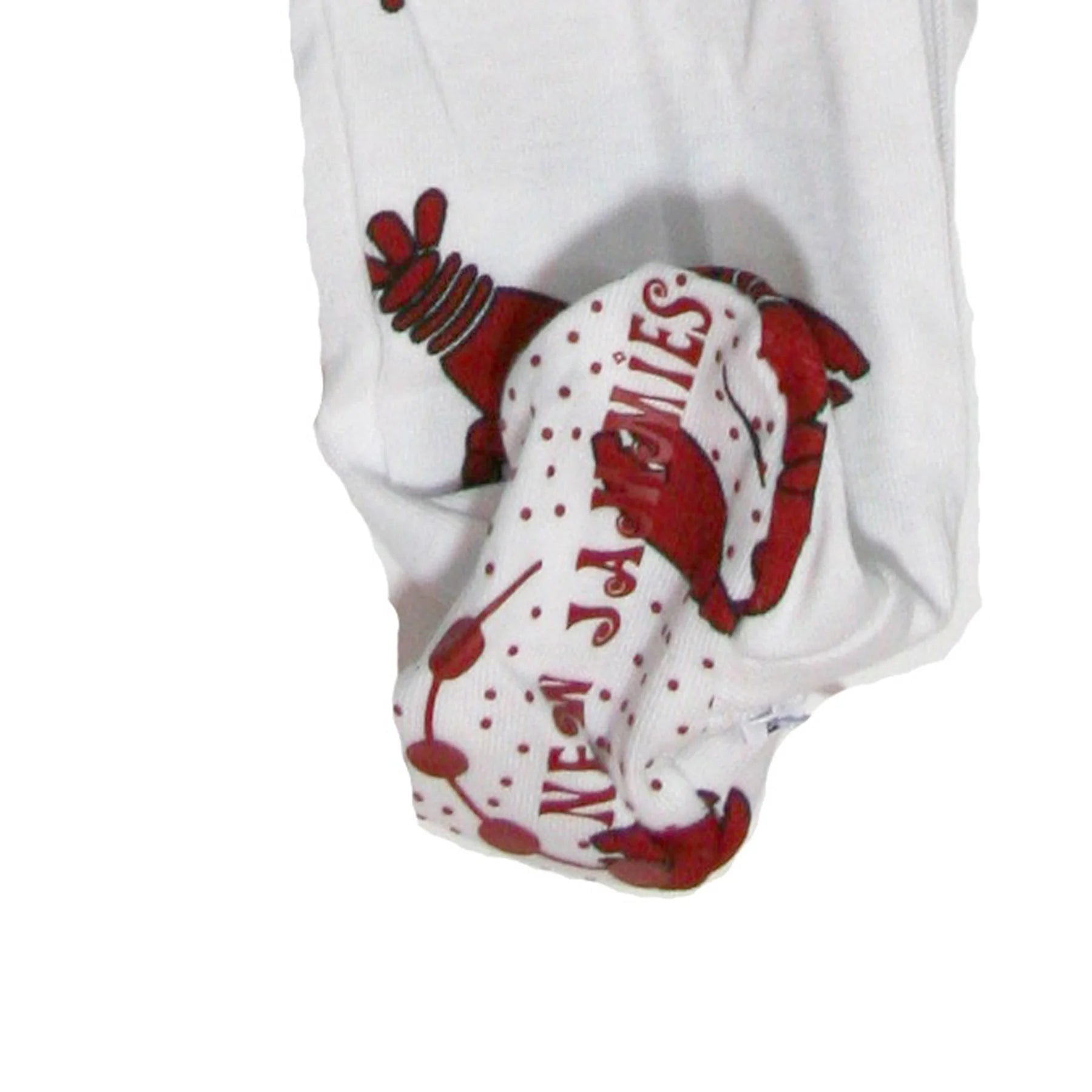 White baby booties with a red lobster and polka dot pattern, featuring the text &