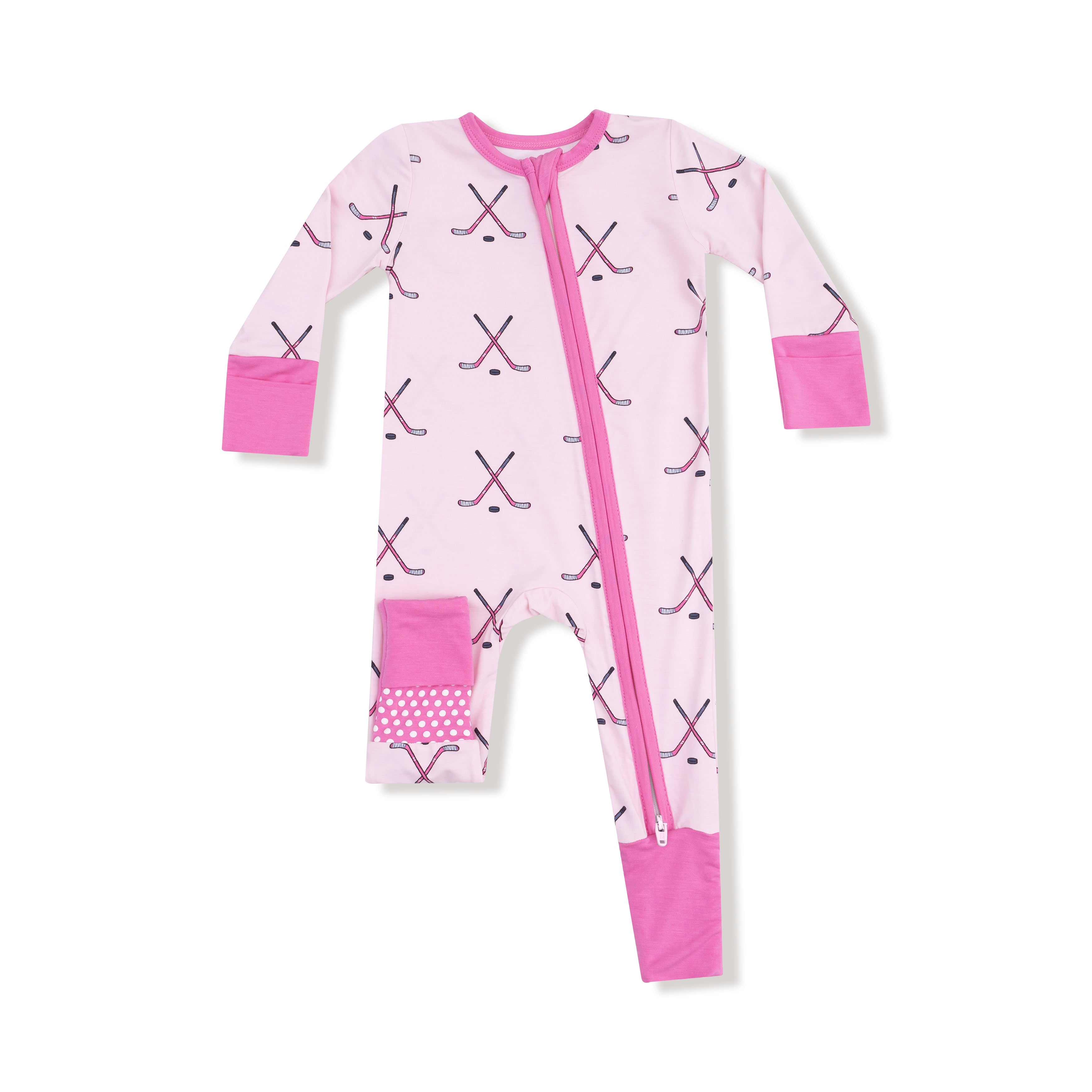 Pink baby onesie with hockey stick pattern on a white background
