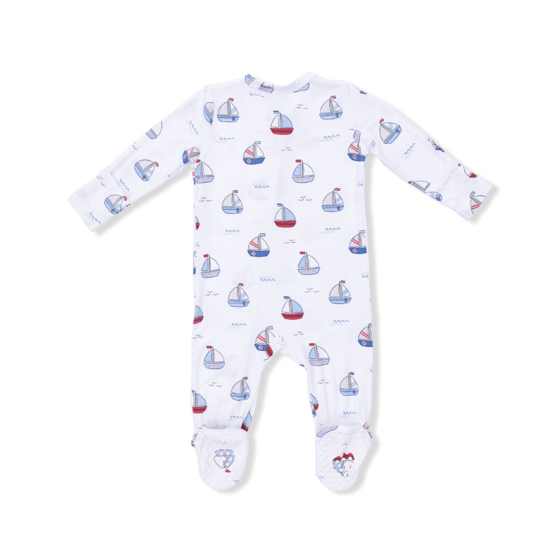 Baby onesie with sailboat pattern on a white background