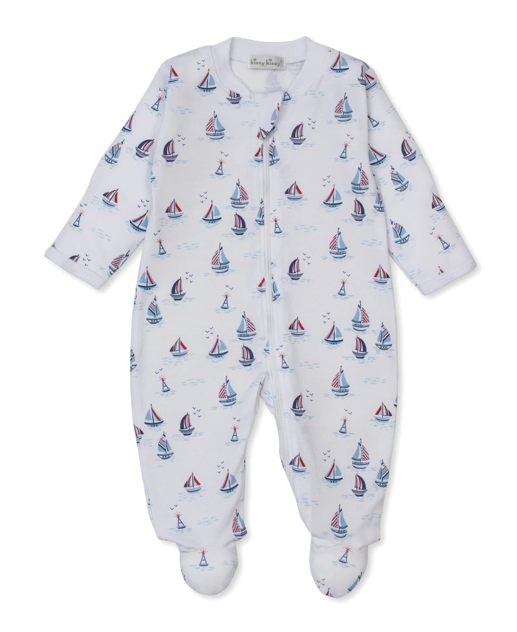white footie with red white and blue sailboats all over