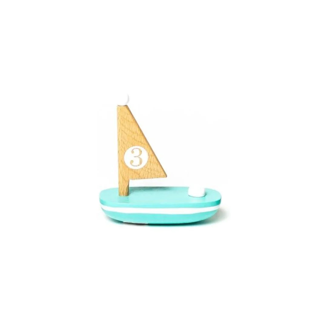 wooden sailboat with a number 3 bath toy