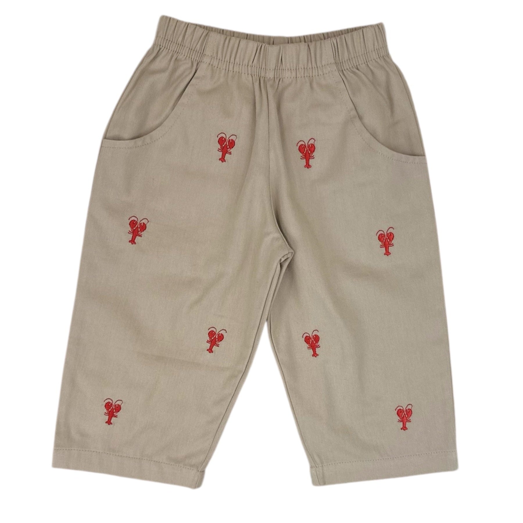 Beige pants with red lobster embroidery on a tan background