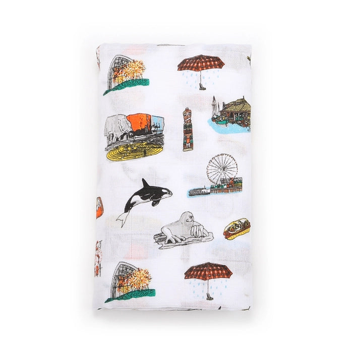 swaddle shows ferris wheel, umbrella, whale