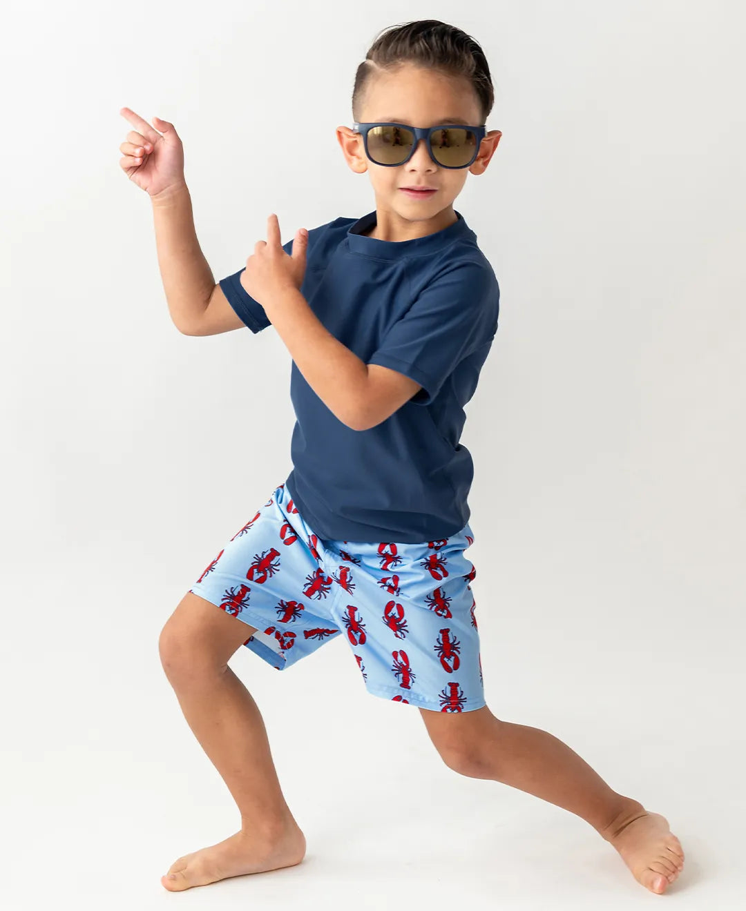 boy wearing swim trunks