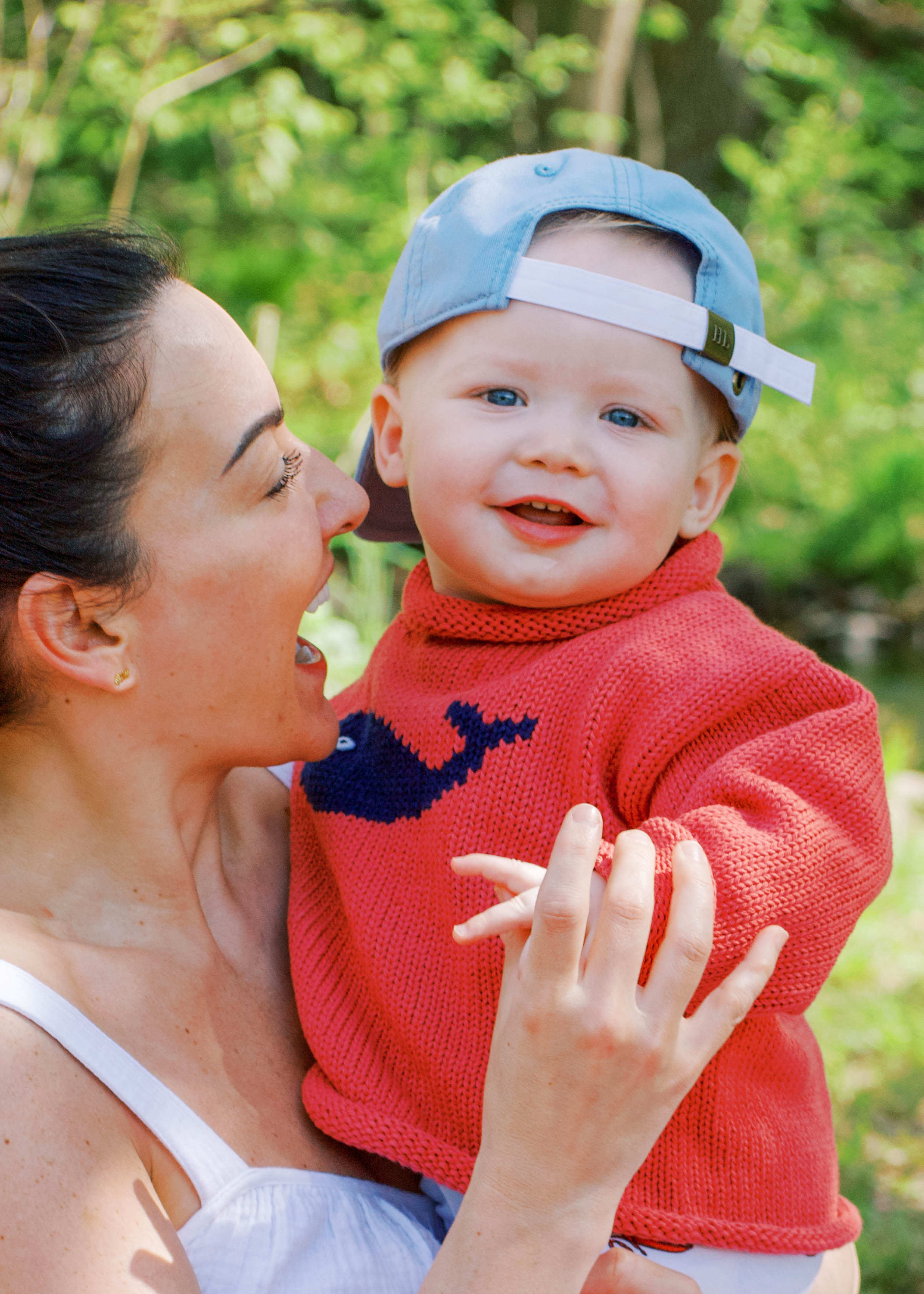 mom and baby. baby is wearing sweater