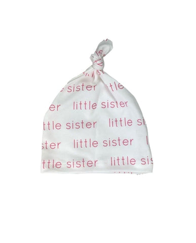 whit hat with little sister written in pink all over