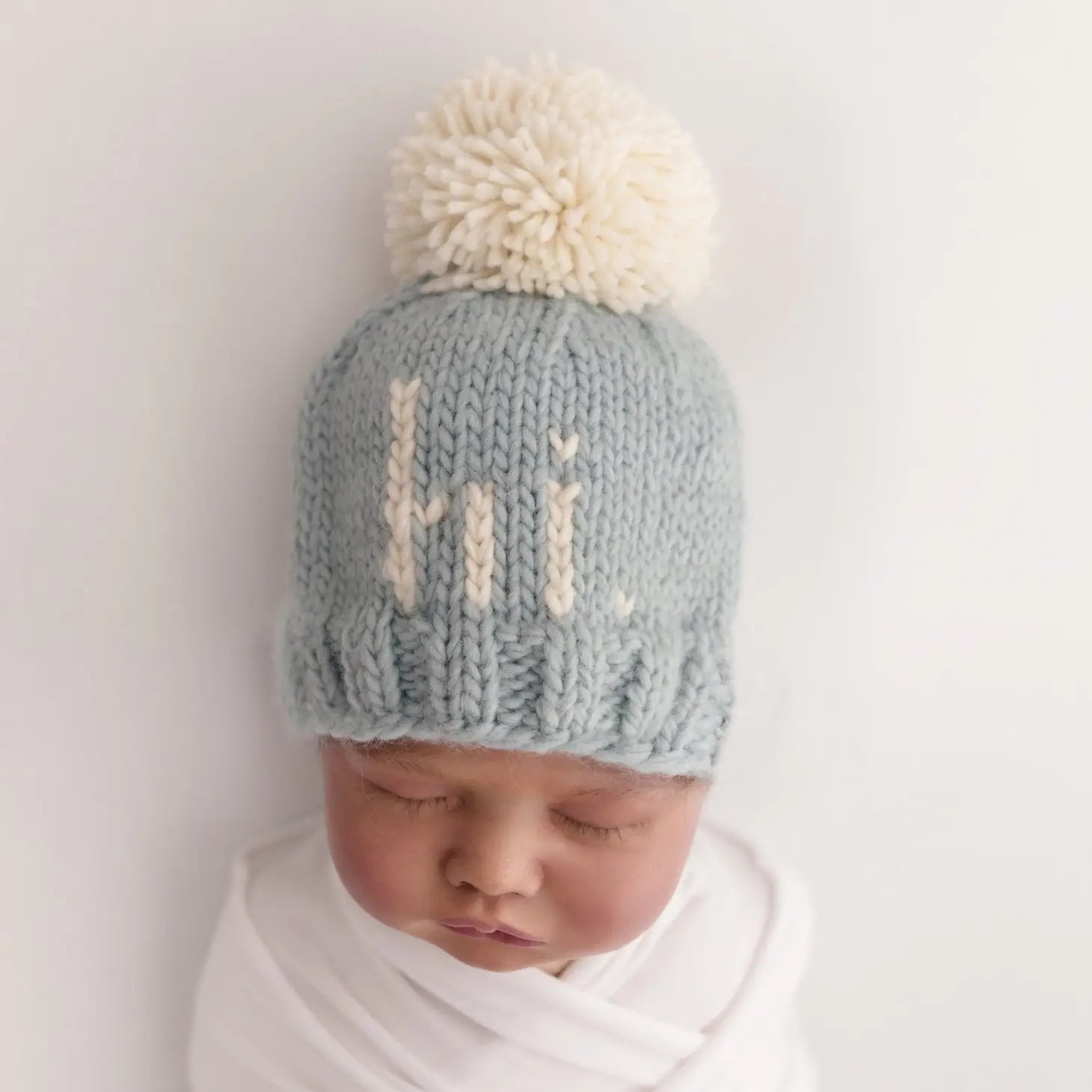 baby wearing blue hi beanie