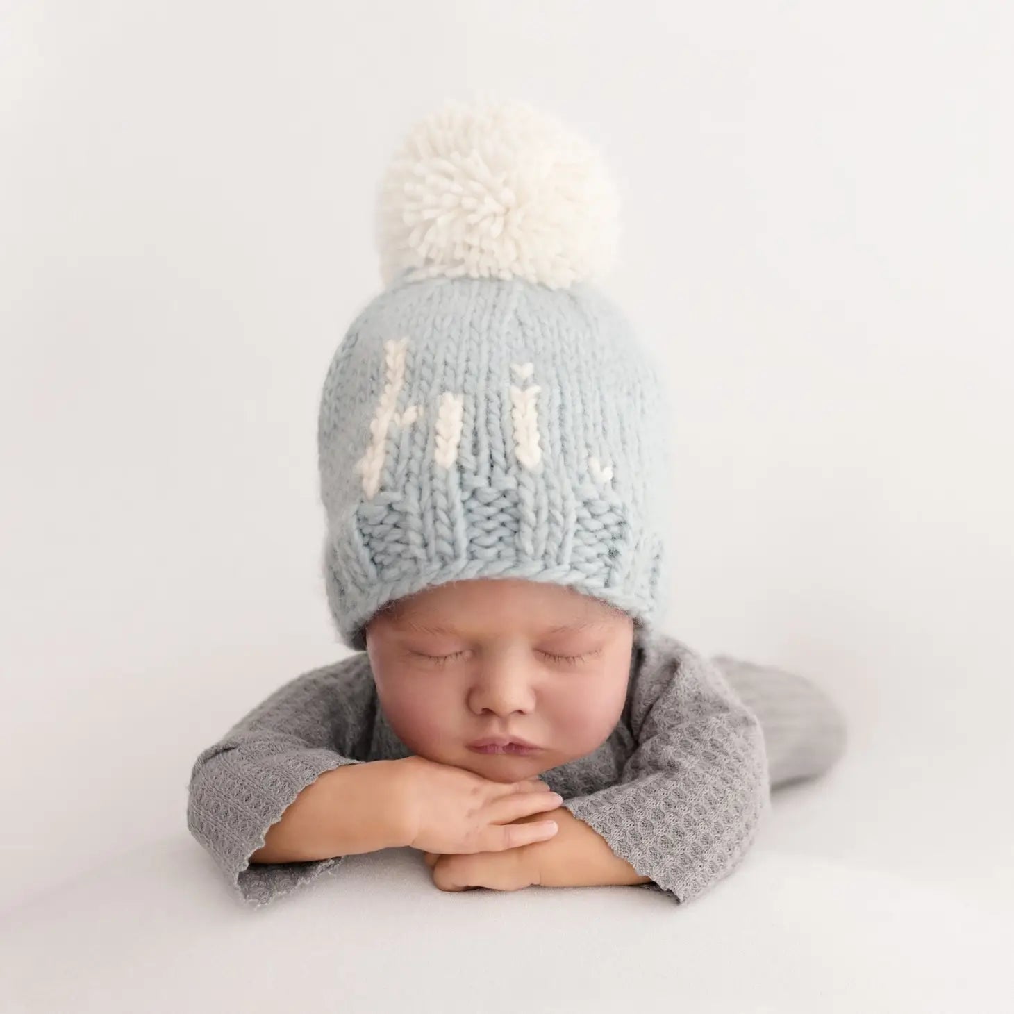 baby wearing blue hi beanie