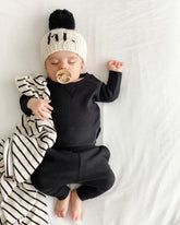 baby sleeping wearing hi beanie