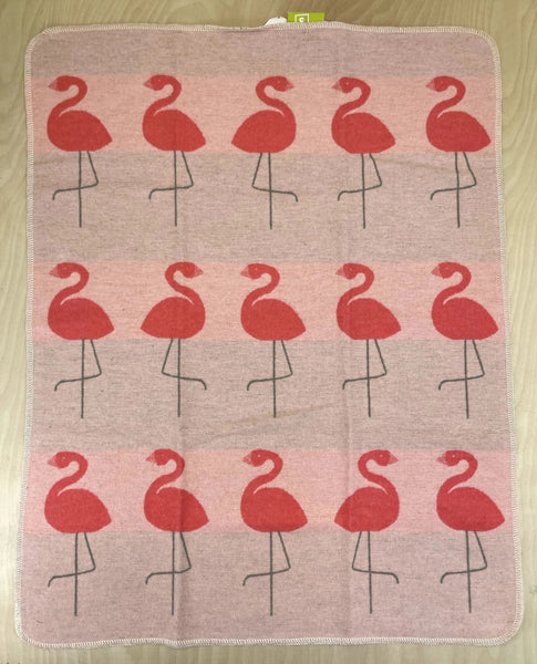 pink blanket with darker pink flamingos