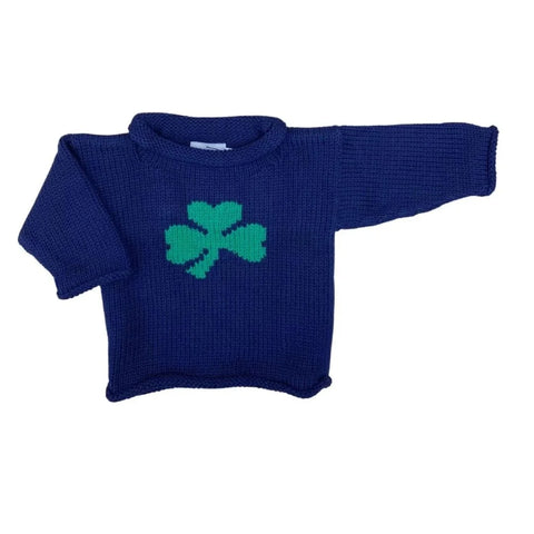navy roll neck sweater with large green shamrock knitted on front center