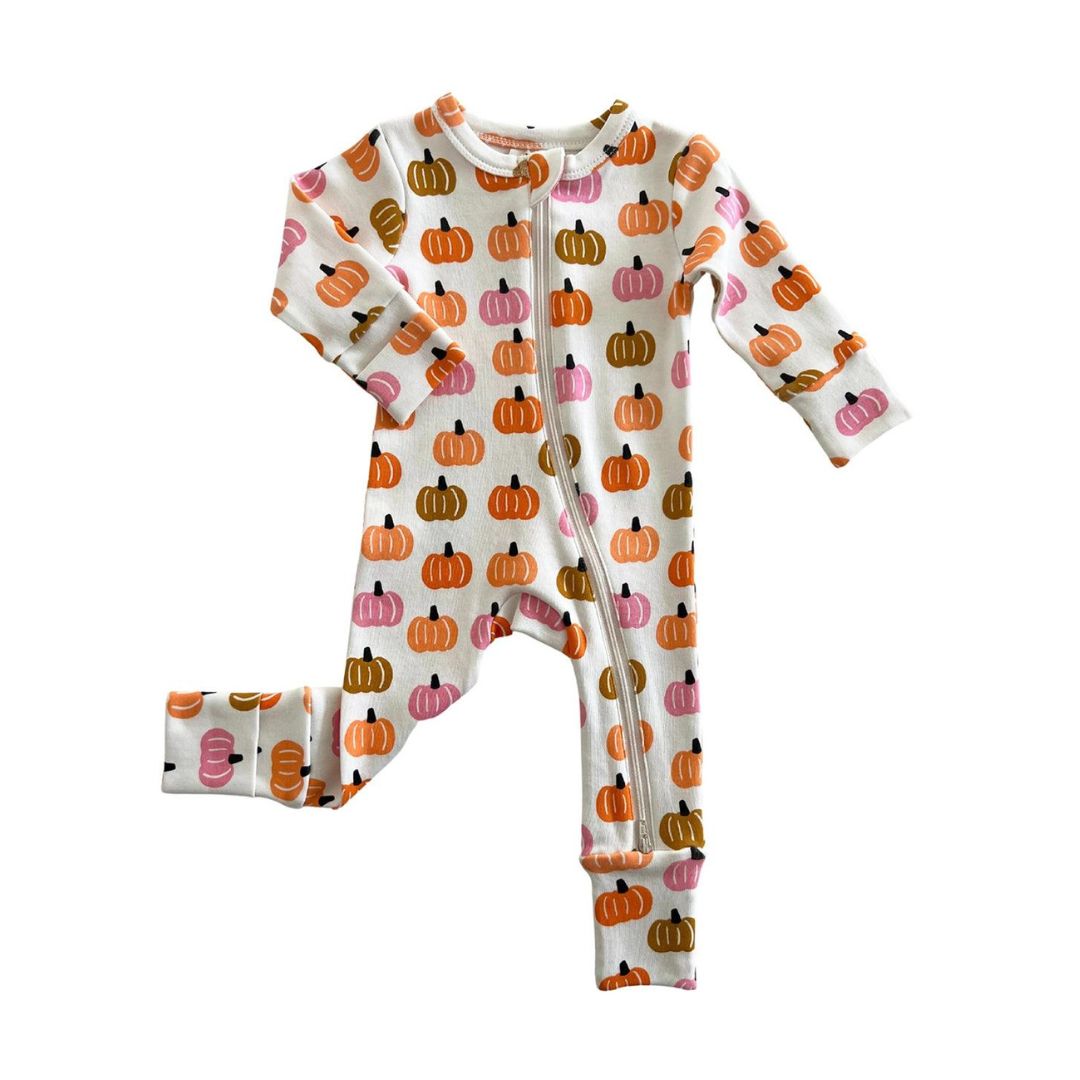 romper with orange, tan and pink pumpkins all over