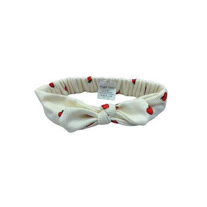 white headband with apples