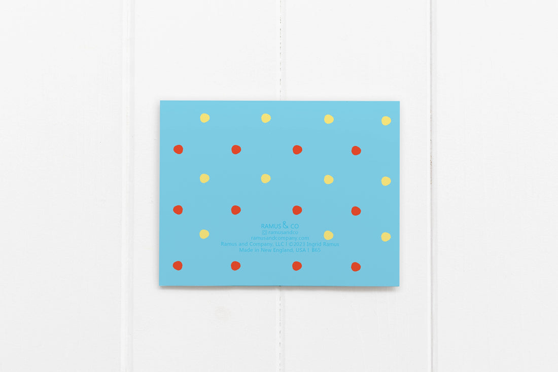 back of card has red and yellow polka dots