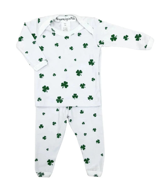 white long sleeve and long pant pajamas with green shamrocks all over