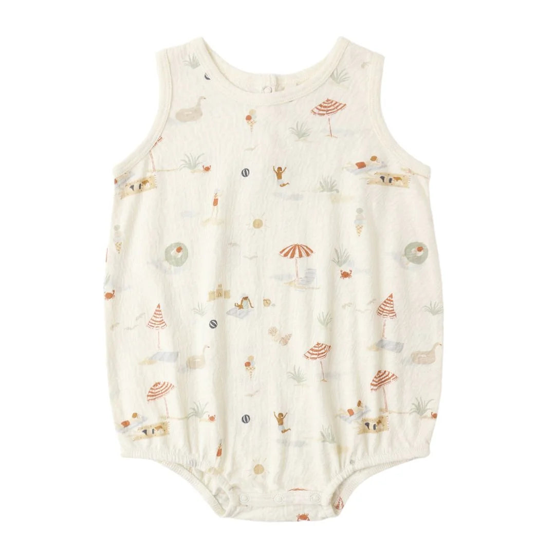 Baby romper with beach pattern on a white background
