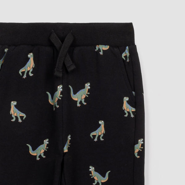 black joggers with dinosaur print