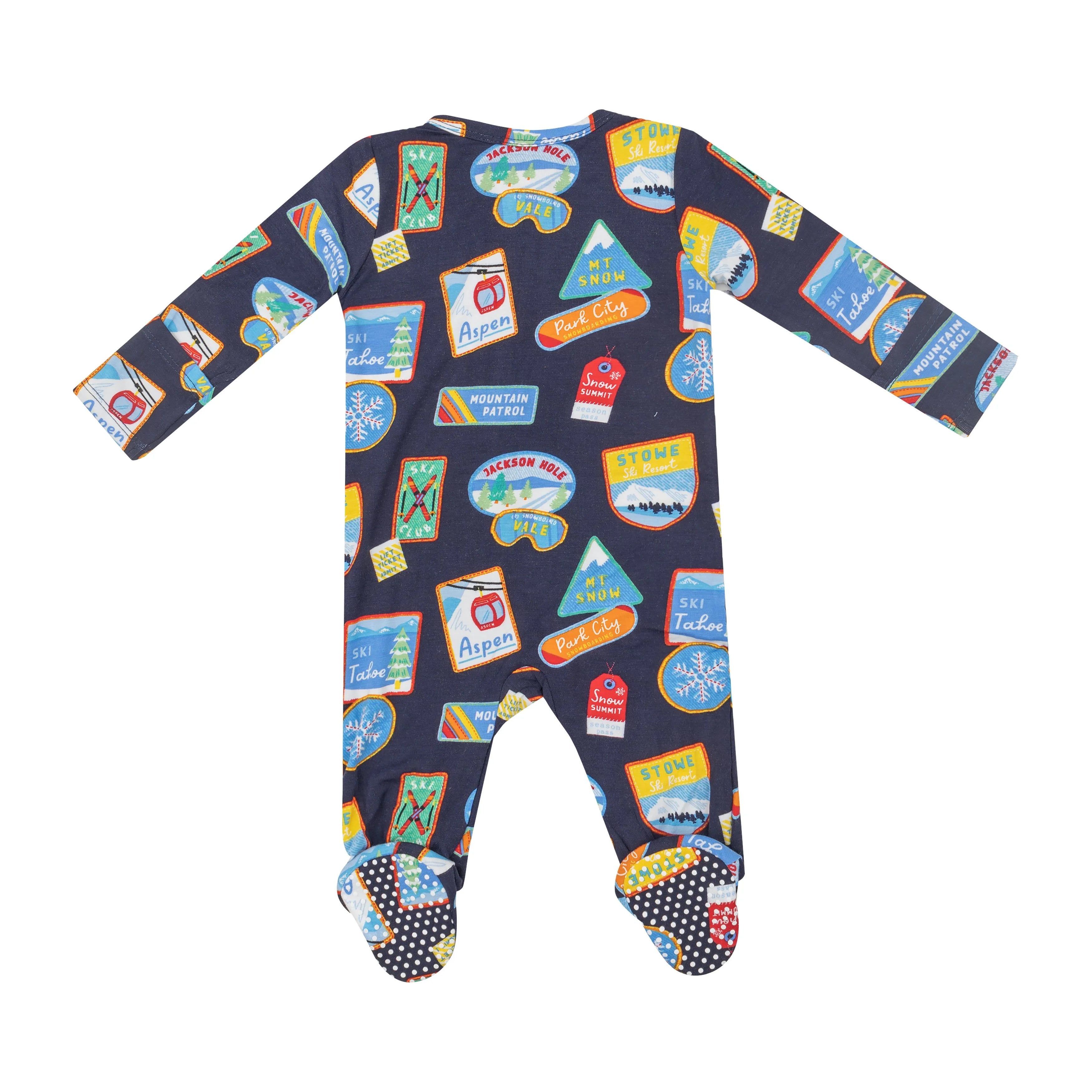 black baby footie with colorful vintage ski patch design all over