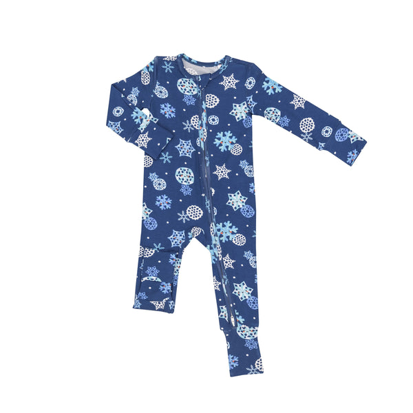 dark blue romper with snowflakes all over