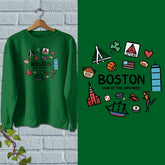 A green crewneck sweatshirt with a colorful &