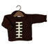 A dark brown knit sweater designed like a football, featuring a cream-colored lacing detail on the front, displayed on a wooden hanger against a white background.