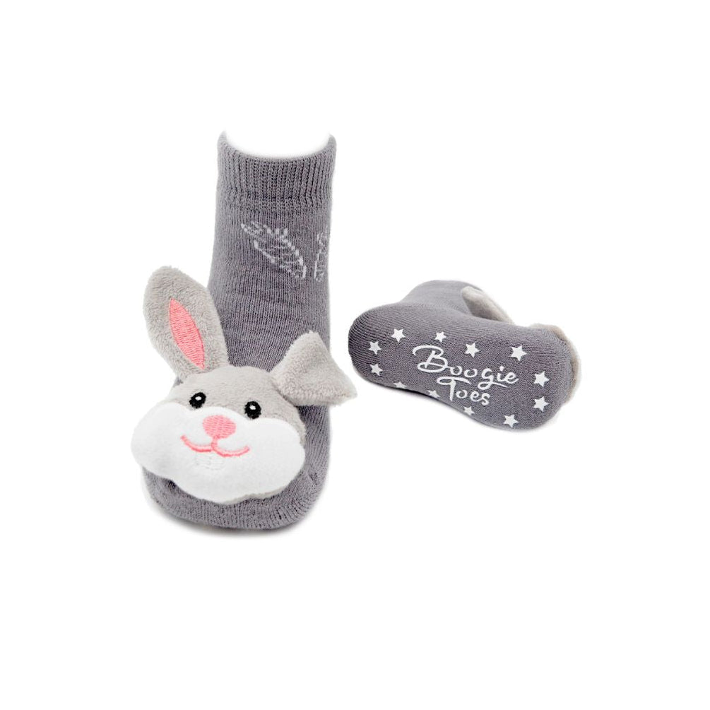 Gray bunny slipper socks with a white sole on a white background
