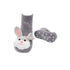 Gray bunny slipper socks with a white sole on a white background