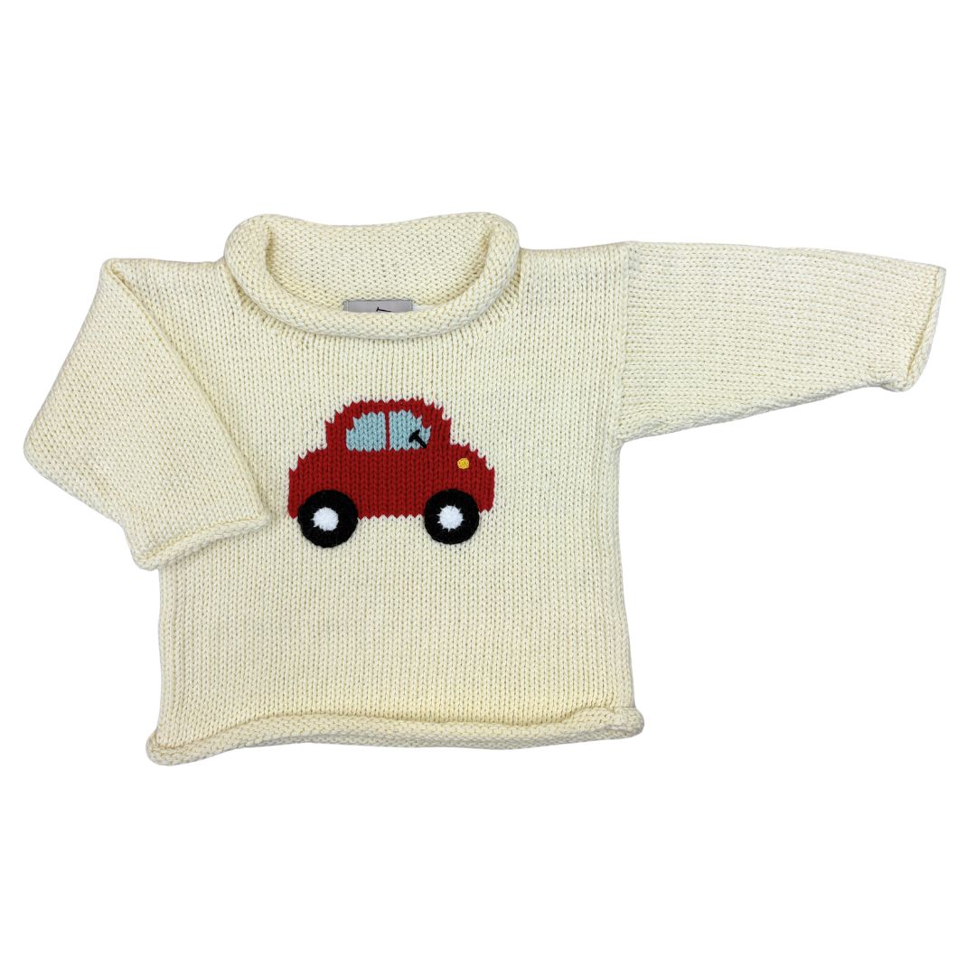 Cream-colored sweater with a red car design on a white background