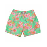 green swim shorts with coastal shells design