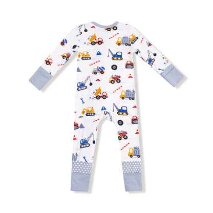 Baby onesie with construction vehicle pattern on a white background