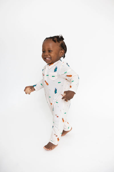 cream golf romper for baby