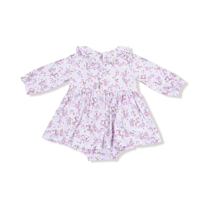 Floral-patterned baby romper on a white background