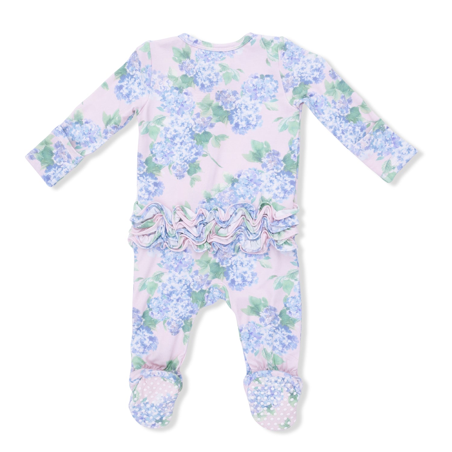 Baby onesie with floral pattern and ruffle details on a white background