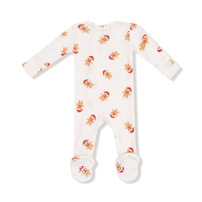 Baby onesie with gingerbread man pattern on a white background
