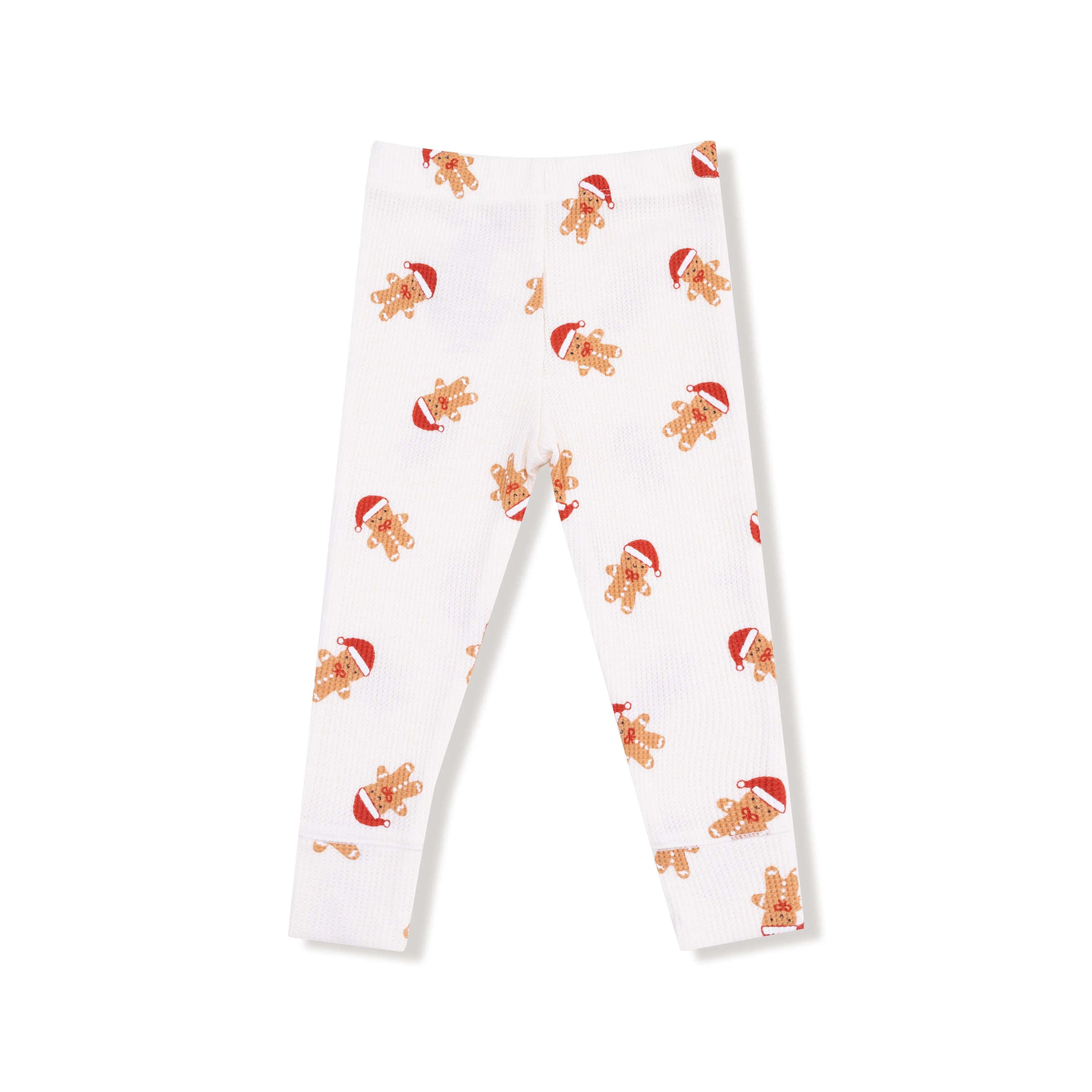 White leggings with gingerbread man pattern on a white background
