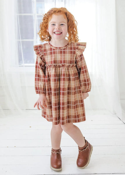 girl wearing dress with boots