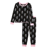 black long pajamas with pink trim and skeletons all over